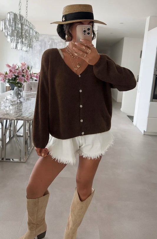 Gilet avec bouton